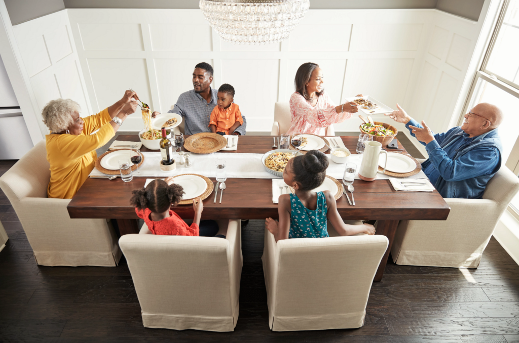 Family having breakfast at the dining table | Clark Dunbar Flooring Superstore